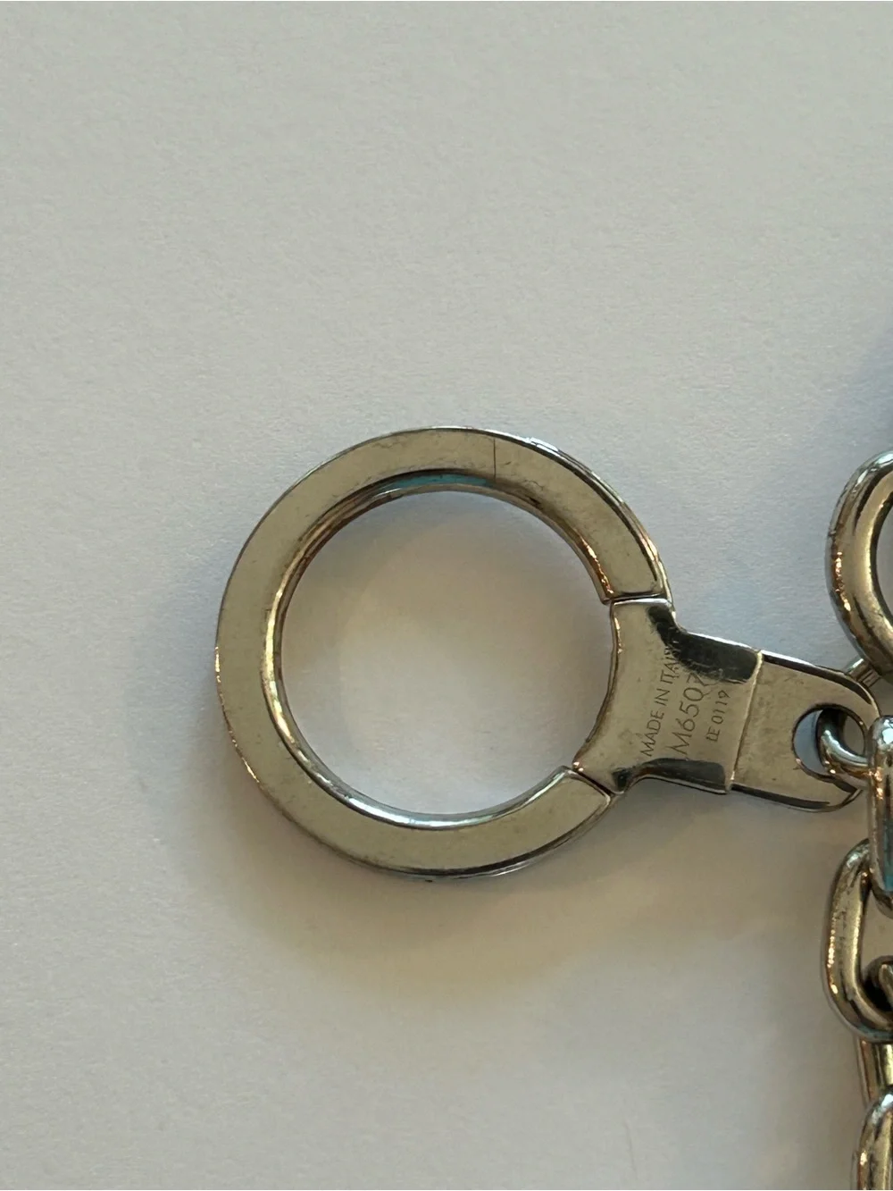 Louis Vuitton Silver Metal LV Logo Keyring Charm
